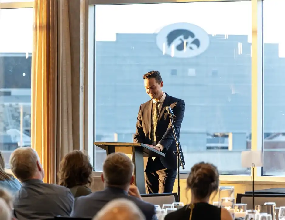 Dr. Logan Sardzinski speaking at a lecture